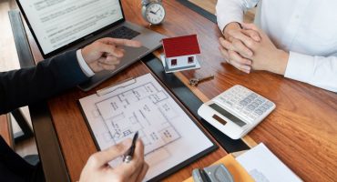 Commercial real estate investor avoiding mistakes through careful analysis in 2025