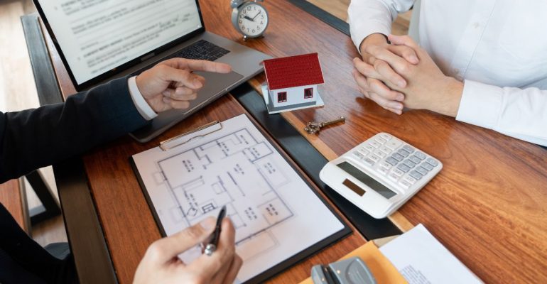 Commercial real estate investor avoiding mistakes through careful analysis in 2025